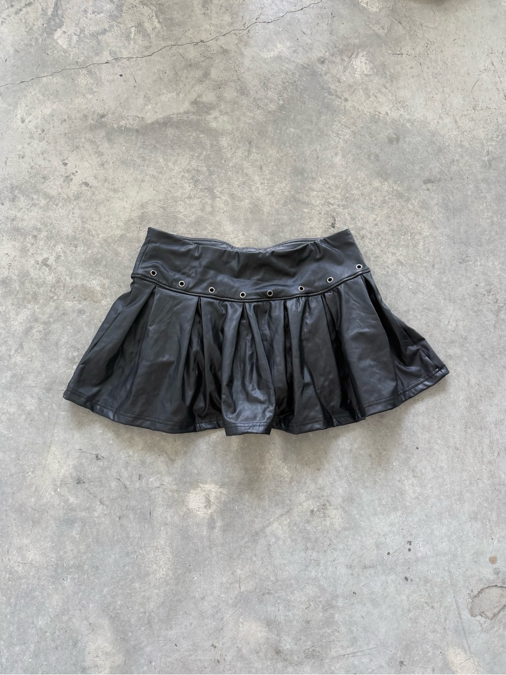 Black Pleated Faux Leather Mini Skirt with Eyelet Waist
